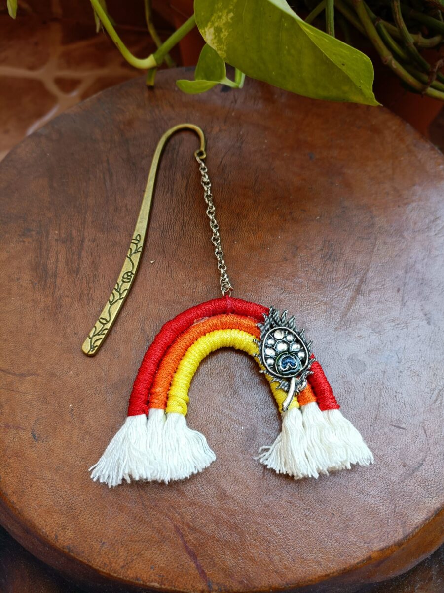 Spectrum of Dreams: Rainbow Bookmark with Peacock Charm
