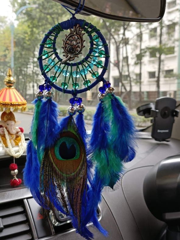 Regal Beauty: Peacock Inspired Car Ornament
